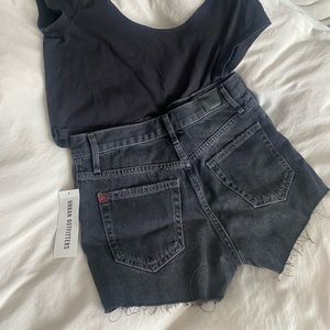 Black denim shorts and black crop top